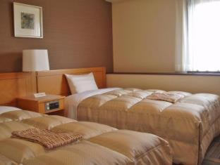 Hotel Route-Inn Suzuka Pokoj fotografie